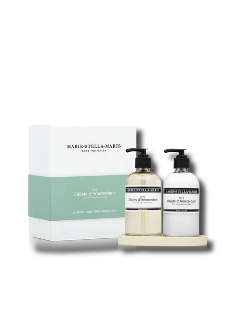 A sleek set of Marie-Stella-Maris Luxury Hand Care Essentials featuring hand soap, hand lotion, and a stylish black presentation tray. The products are elegantly packaged with a minimalist design, perfect for adding sophistication to any space.